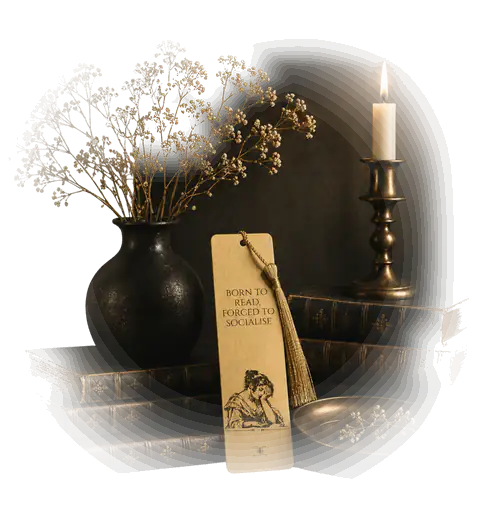 Candle-lit still life: dried gypsophila in a dark vase, antique books and a gold Crescent Chapters bookmark